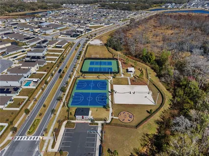 an aerial view of a house with a ocean view