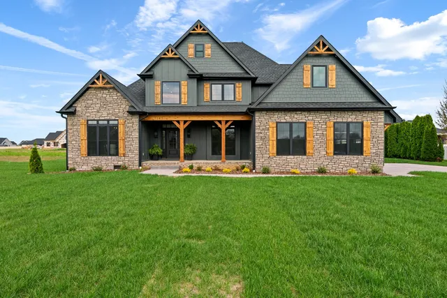 front view of a house with a yard