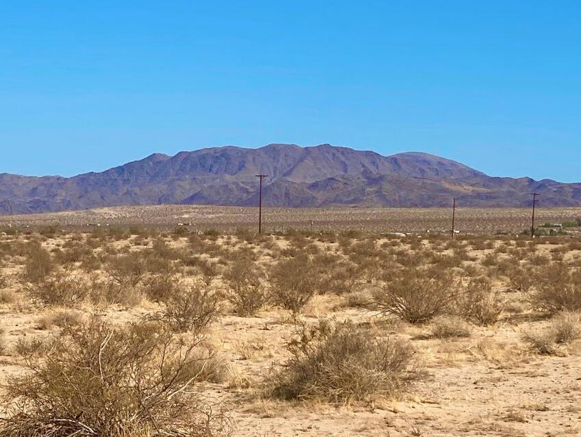 138 Amboy Road Twentynine Palms, CA 92277 - Photo 20 of 26 a view of an ocean with a mountain