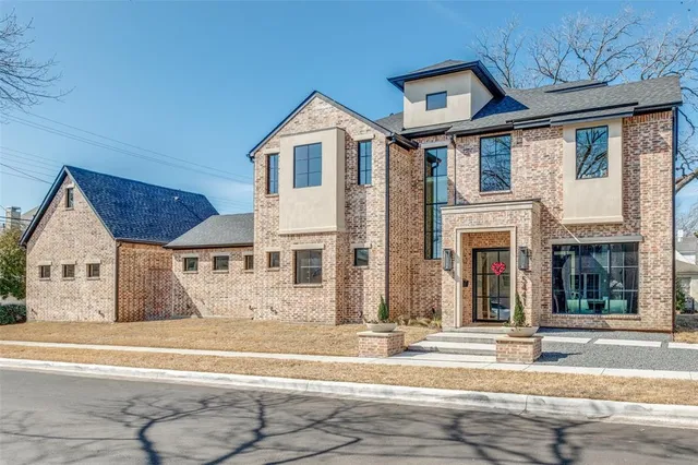a view of a house with a street
