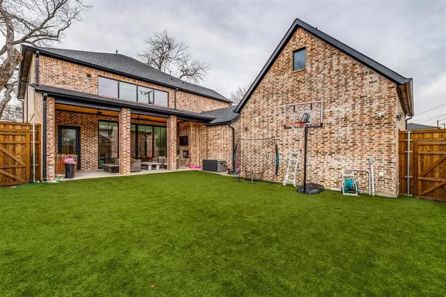 a bedroom with furniture and a flat screen tv