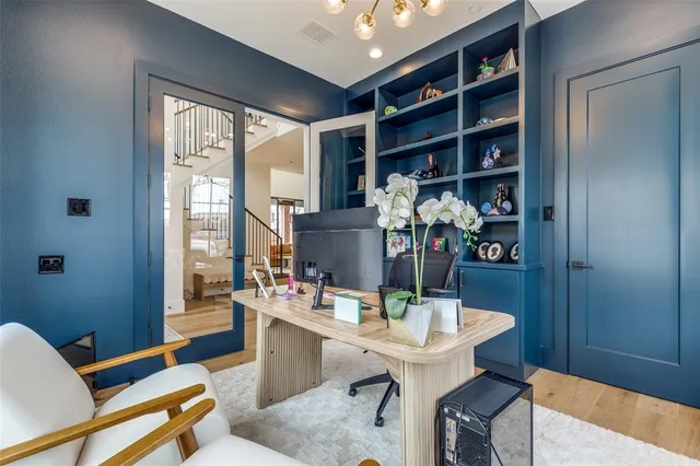 a view of a dining room with furniture and window