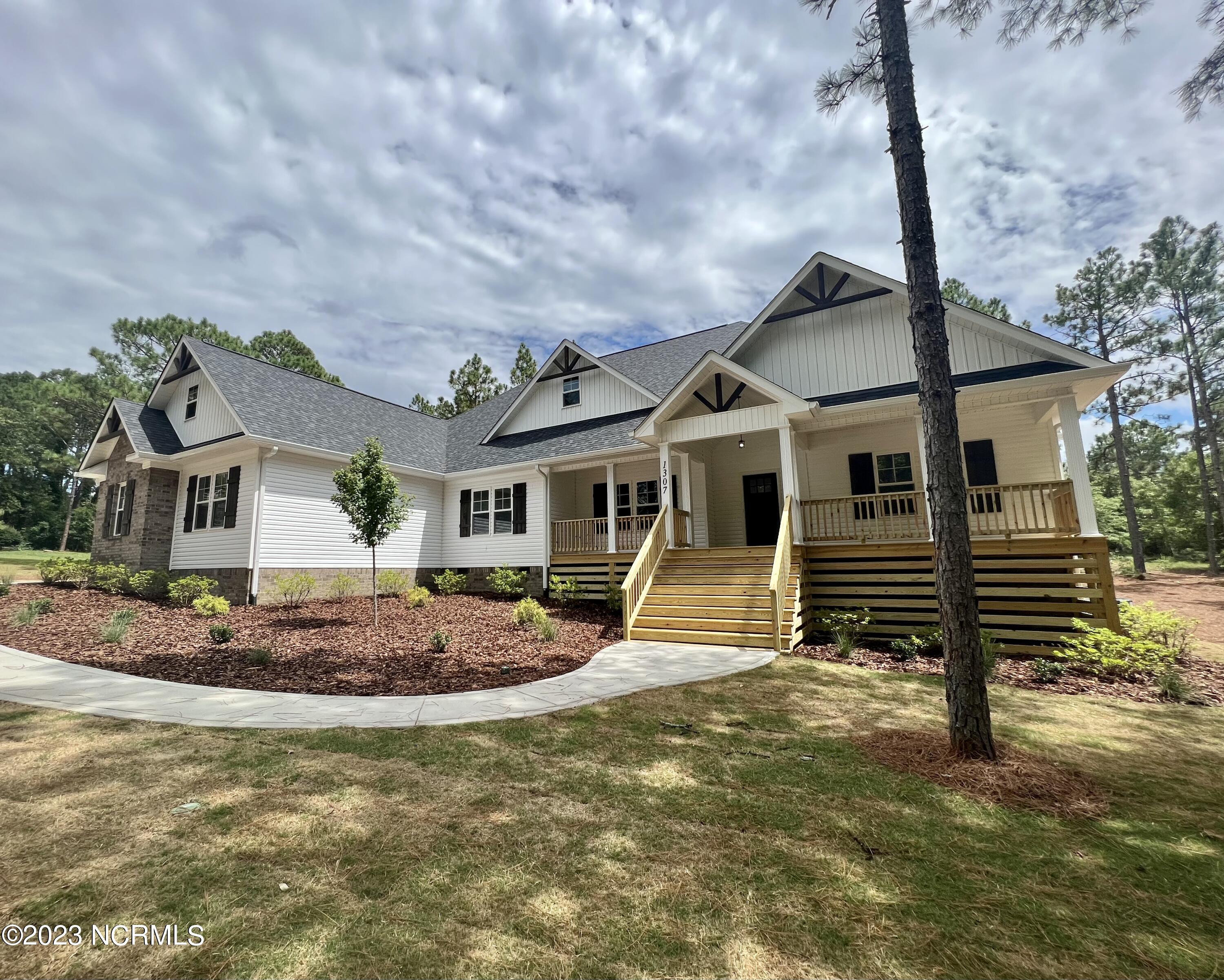 1307 Valley View Road Southern Pines, NC 28387 - Photo 3 of 49 1287F0C2-3874-4EFF-880F-562926494794