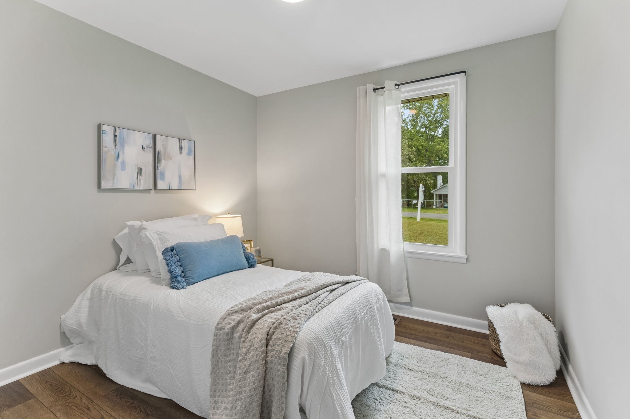 3908 Cedar Street Centerville, TN 37033 - Photo 21 of 31 a bedroom with a bed and a window