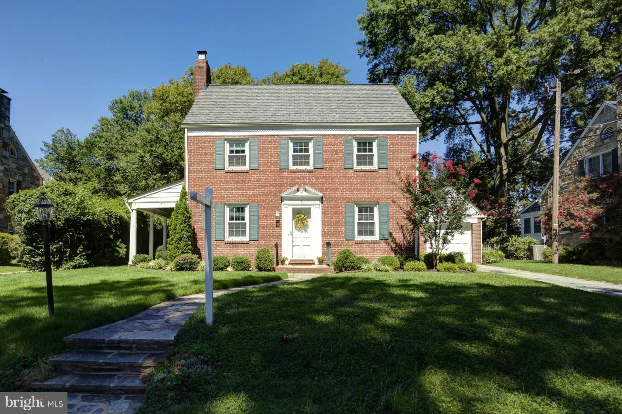 8 Aintree Road Towson, MD 21286 - Photo 1 of 27 a front view of a house with a garden