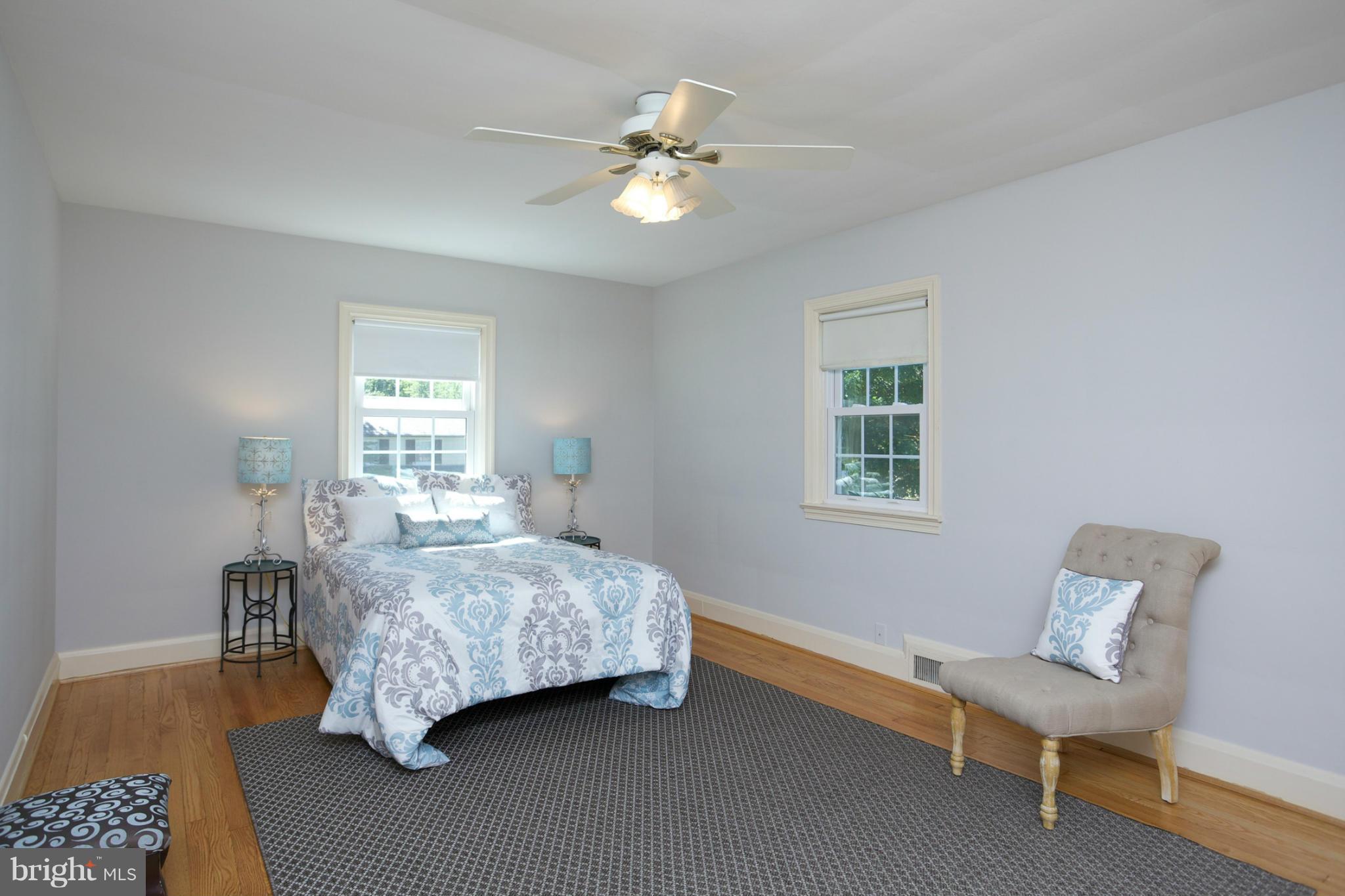 8 Aintree Road Towson, MD 21286 - Photo 14 of 27 a bedroom with a bed and a window