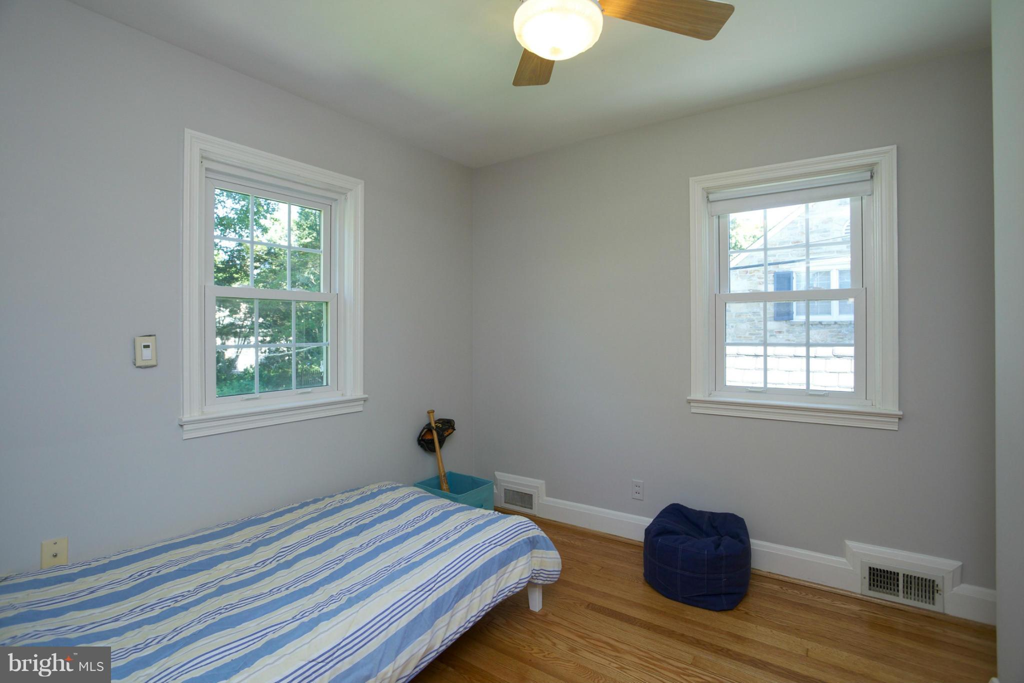 8 Aintree Road Towson, MD 21286 - Photo 19 of 27 a bedroom with a bed and a window
