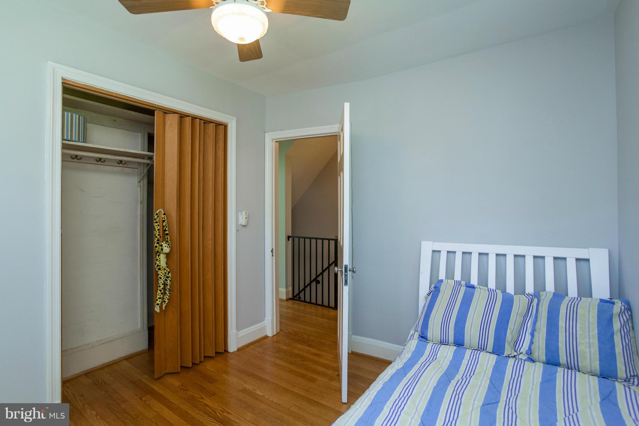 8 Aintree Road Towson, MD 21286 - Photo 20 of 27 a view of a hallway with wooden floor and staircase
