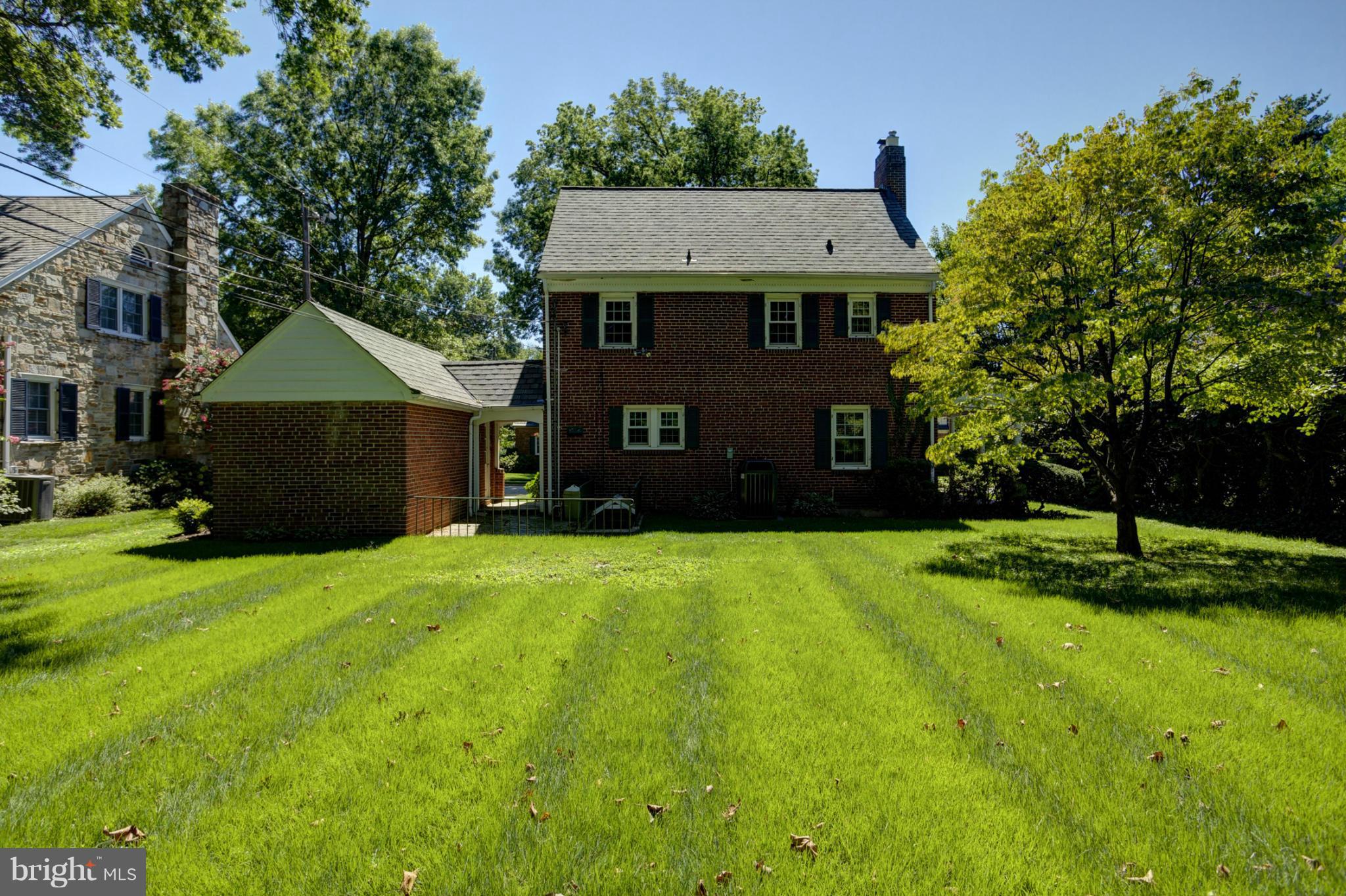 8 Aintree Road Towson, MD 21286 - Photo 3 of 27 a front view of a house with a garden