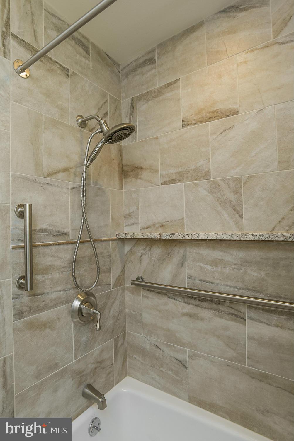 8 Aintree Road Towson, MD 21286 - Photo 21 of 27 a bathroom with a shower