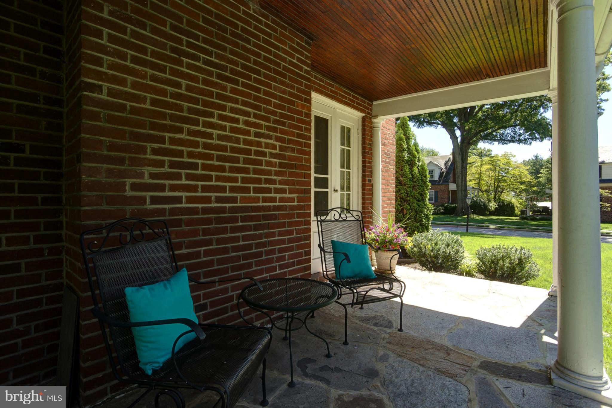 8 Aintree Road Towson, MD 21286 - Photo 6 of 27 a view of a porch with furniture and garden