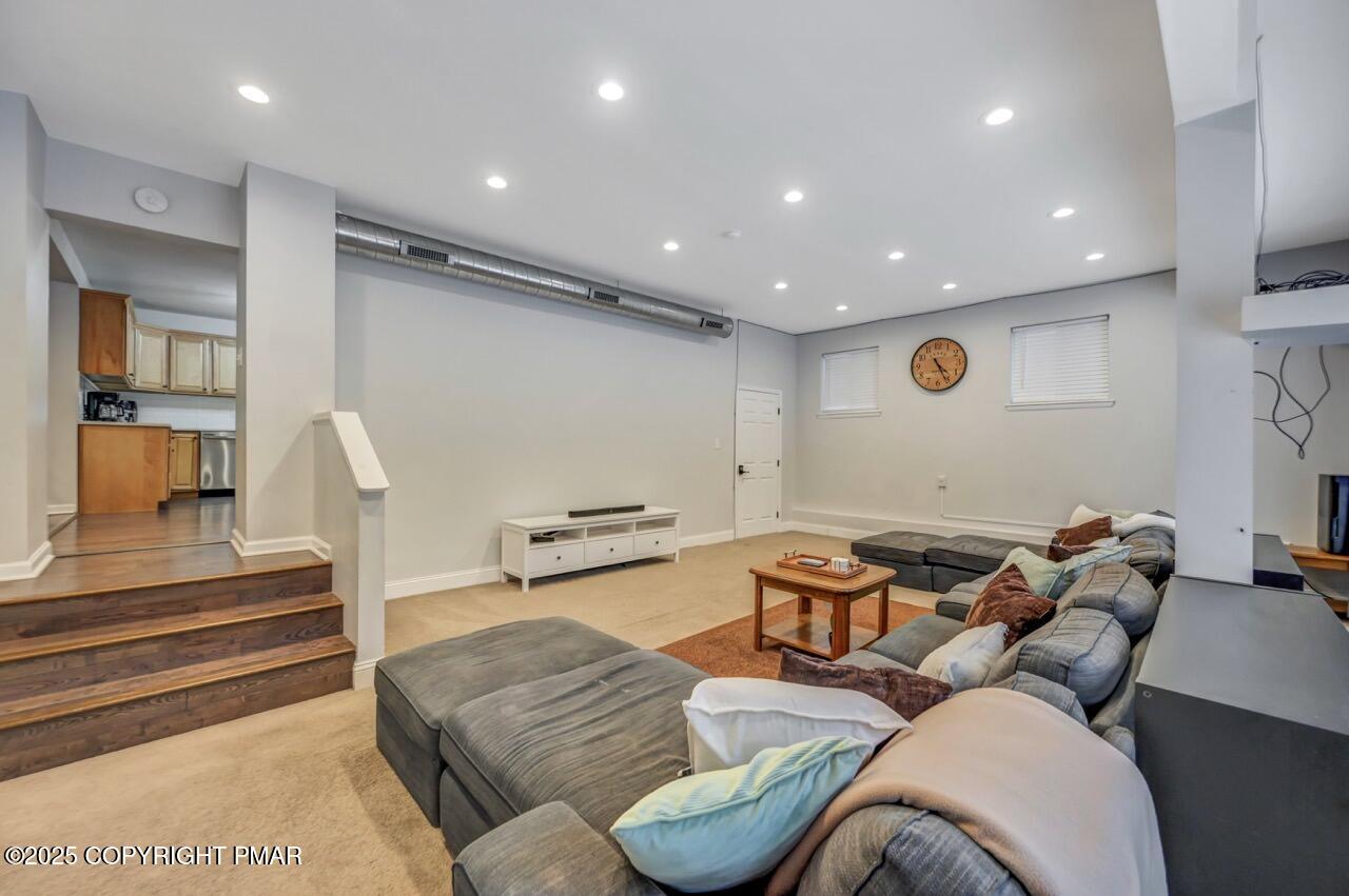 12 Hickory Road Lake Harmony, PA 18624 - Photo 30 of 86 a living room with furniture and a table