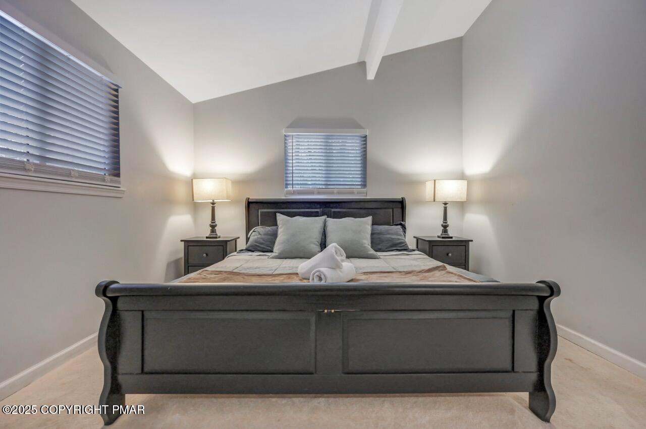 12 Hickory Road Lake Harmony, PA 18624 - Photo 38 of 86 a bedroom with a bed and a night stand