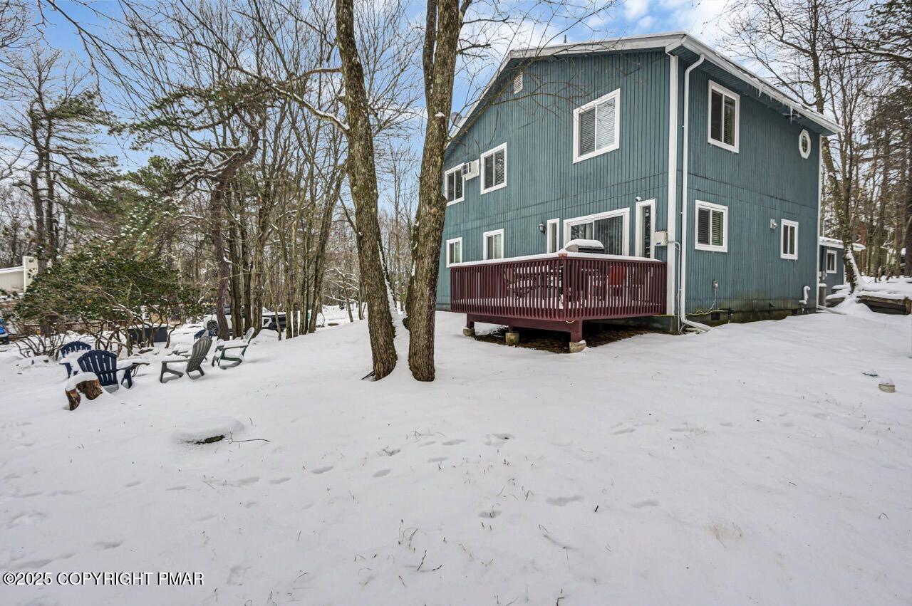 12 Hickory Road Lake Harmony, PA 18624 - Photo 69 of 86 a front view of a house with a yard covered in snow