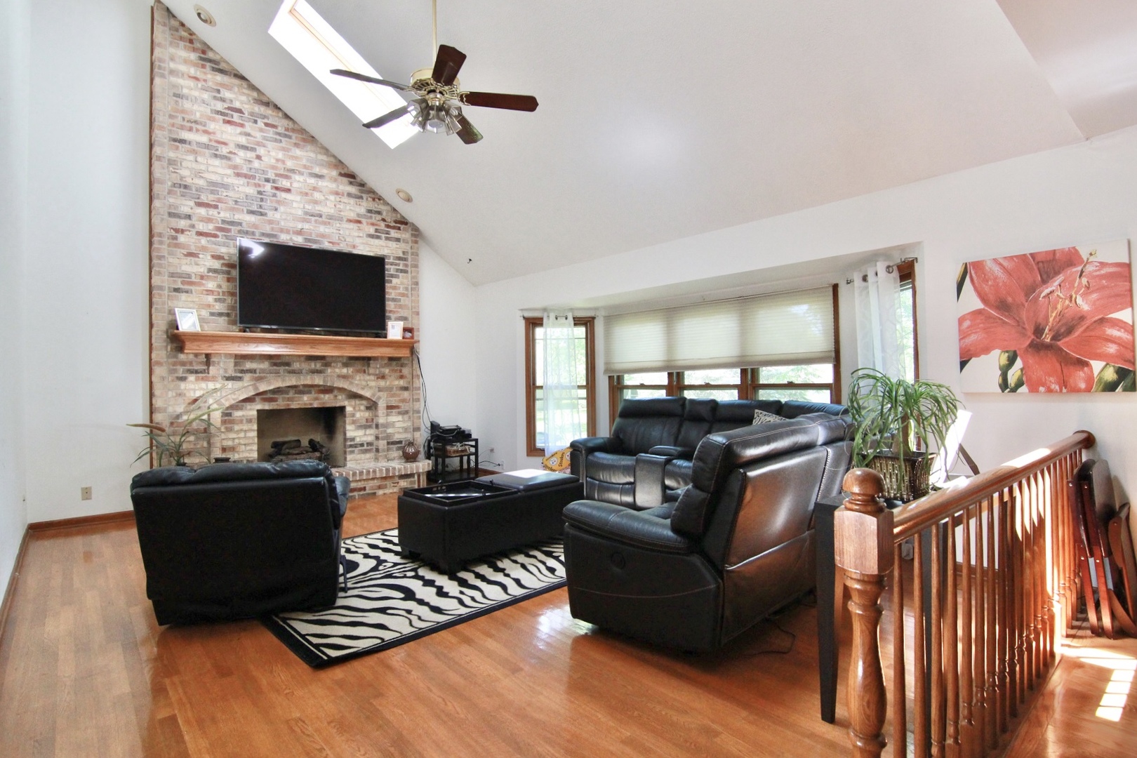 2457 Barkdoll Road Naperville, IL 60565 - Photo 8 of 27 a living room with furniture fireplace and flat screen tv