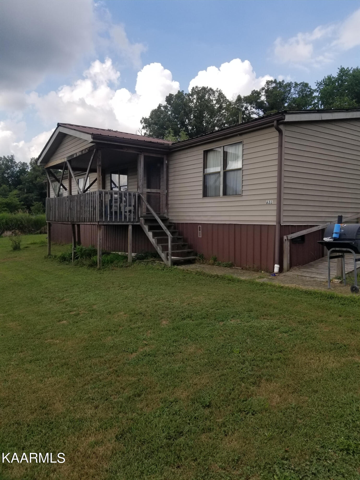 631 Island Ford Road Lancing, TN 37770 - Photo 1 of 15 2