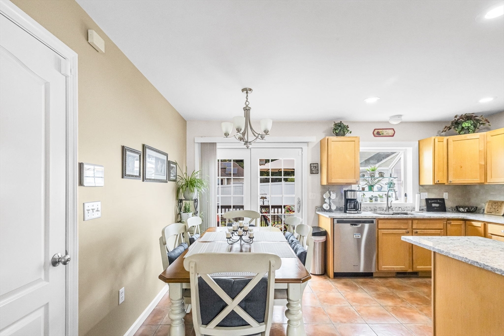 297 Christopher Drive Springfield, MA 01119 - Photo 11 of 30 a view of a kitchen and dining room