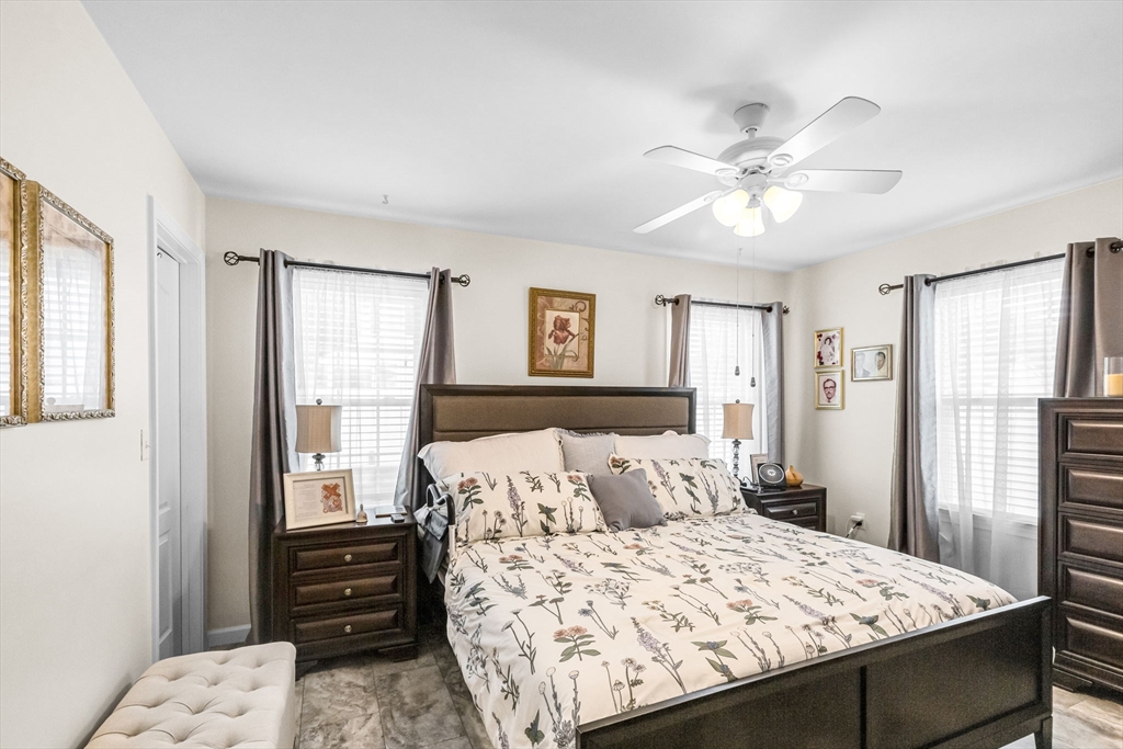297 Christopher Drive Springfield, MA 01119 - Photo 15 of 30 a bedroom with a large bed and a window