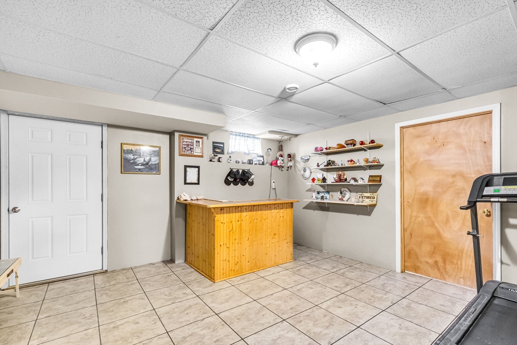 297 Christopher Drive Springfield, MA 01119 - Photo 26 of 30 a view of a kitchen with fridge and workspace