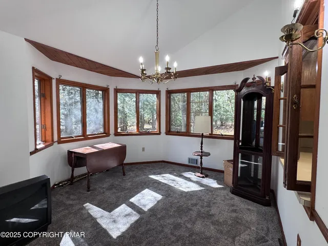 a kitchen with a stove sink and microwave