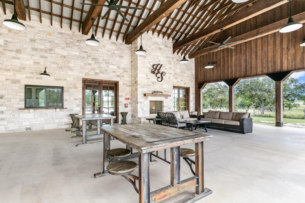 4 Inspiration Loop Fredericksburg, TX 78624 - Photo 8 of 14 a view of a patio with table and chairs and potted plants