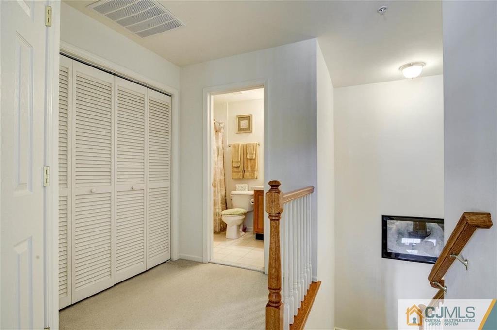 59 Raritan Reach Road, Unit 30 South Amboy, NJ 08879 - Photo 20 of 25 a view of a livingroom with furniture and front door