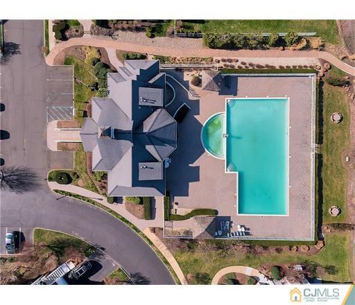 59 Raritan Reach Road, Unit 30 South Amboy, NJ 08879 - Photo 25 of 25 an aerial view of residential houses with outdoor space and parking