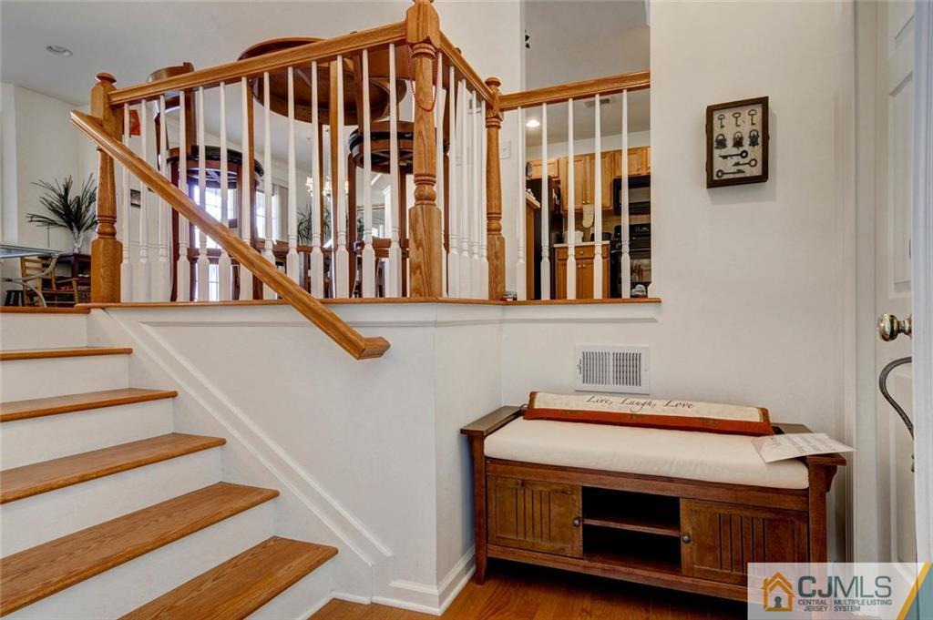 59 Raritan Reach Road, Unit 30 South Amboy, NJ 08879 - Photo 4 of 25 a view of entryway and hall with wooden floor
