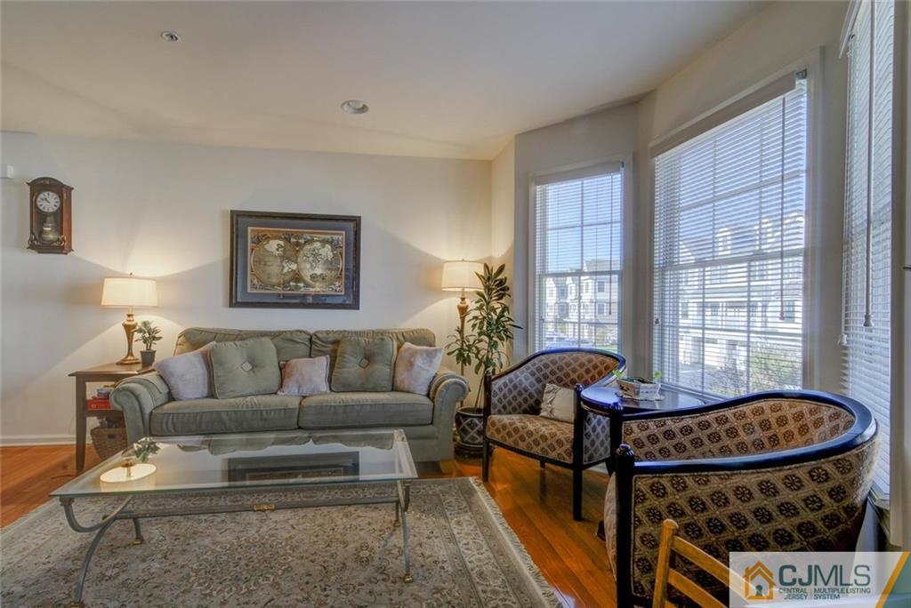 59 Raritan Reach Road, Unit 30 South Amboy, NJ 08879 - Photo 6 of 25 a living room with furniture and a window