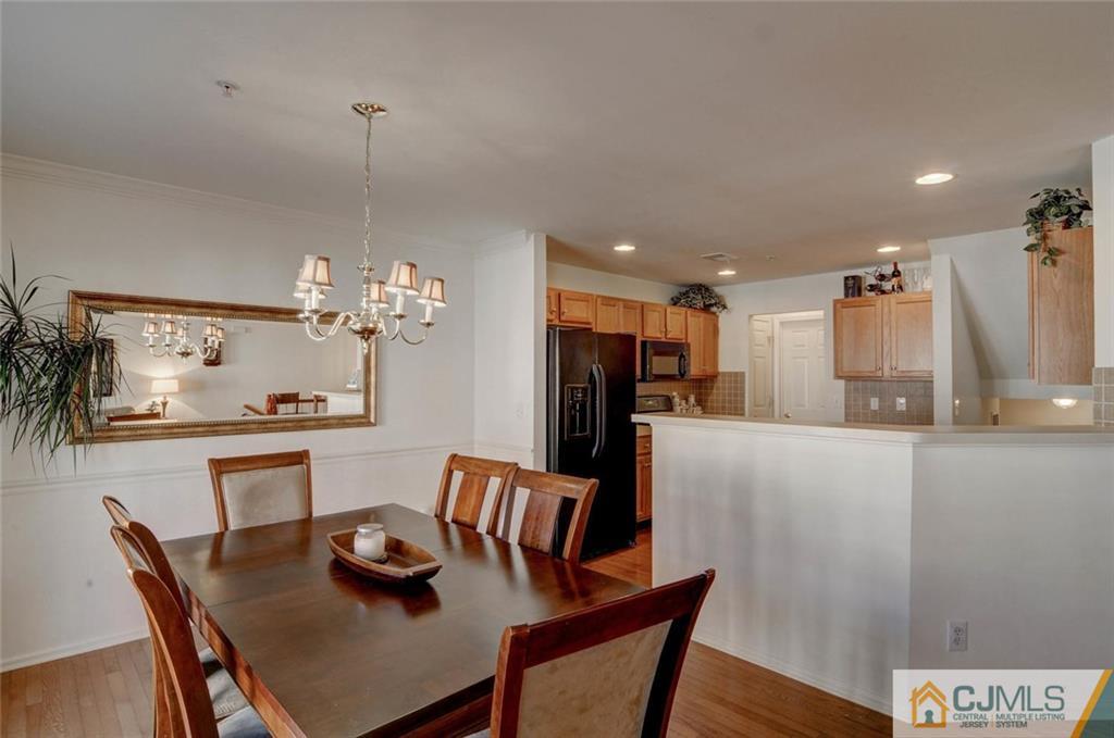 59 Raritan Reach Road, Unit 30 South Amboy, NJ 08879 - Photo 10 of 25 a view of a dining room with furniture