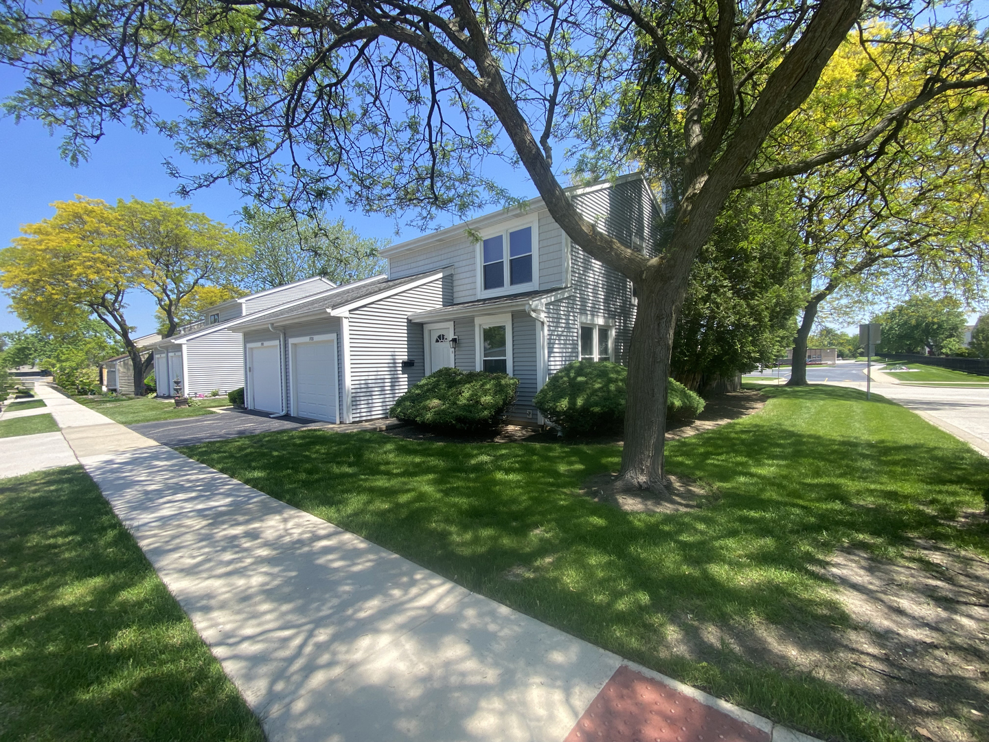 a house view with a garden space
