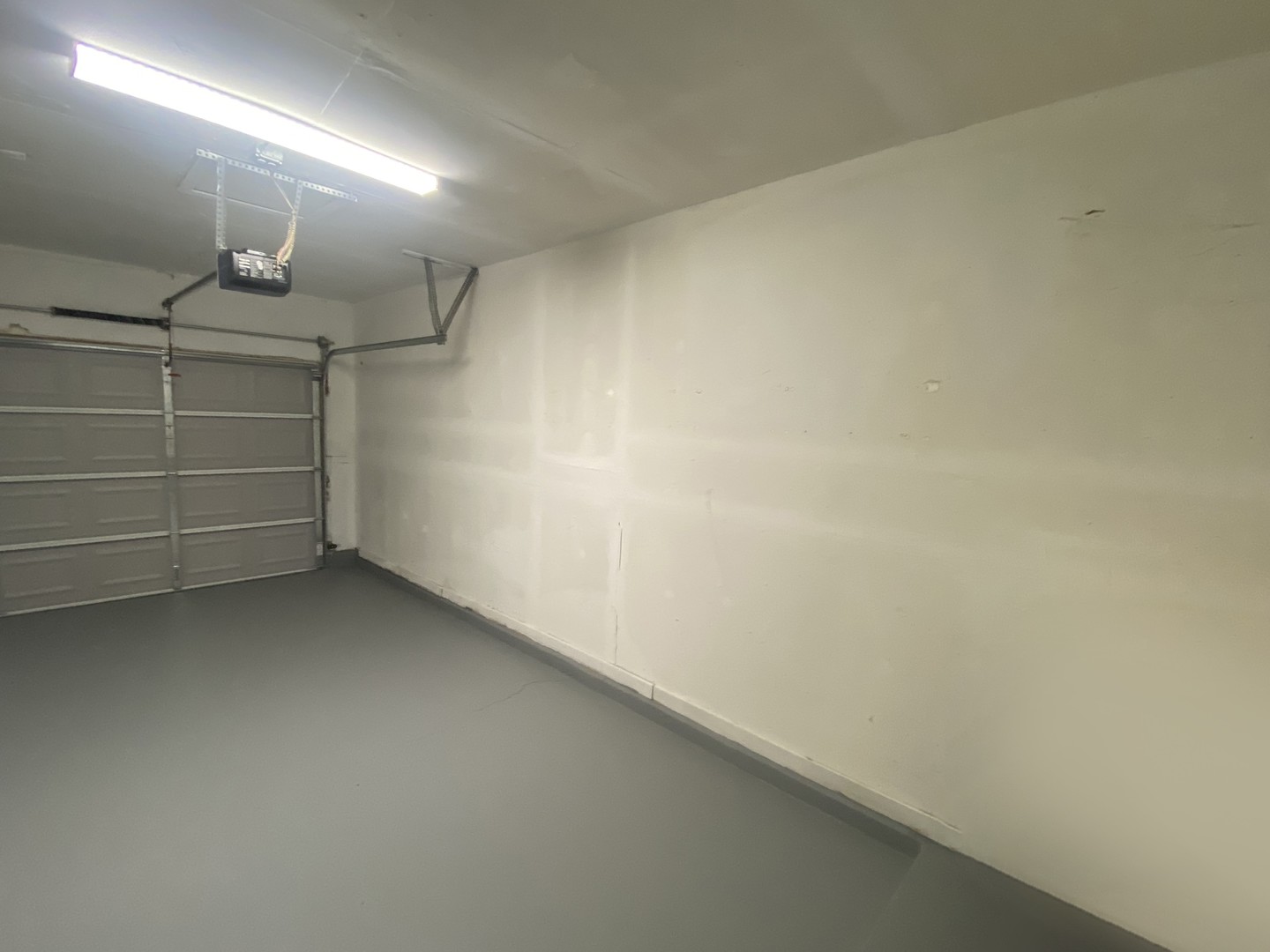 1920 Georgetown Lane Hoffman Estates, IL 60169 - Photo 19 of 28 a view of a room with racks on the wall