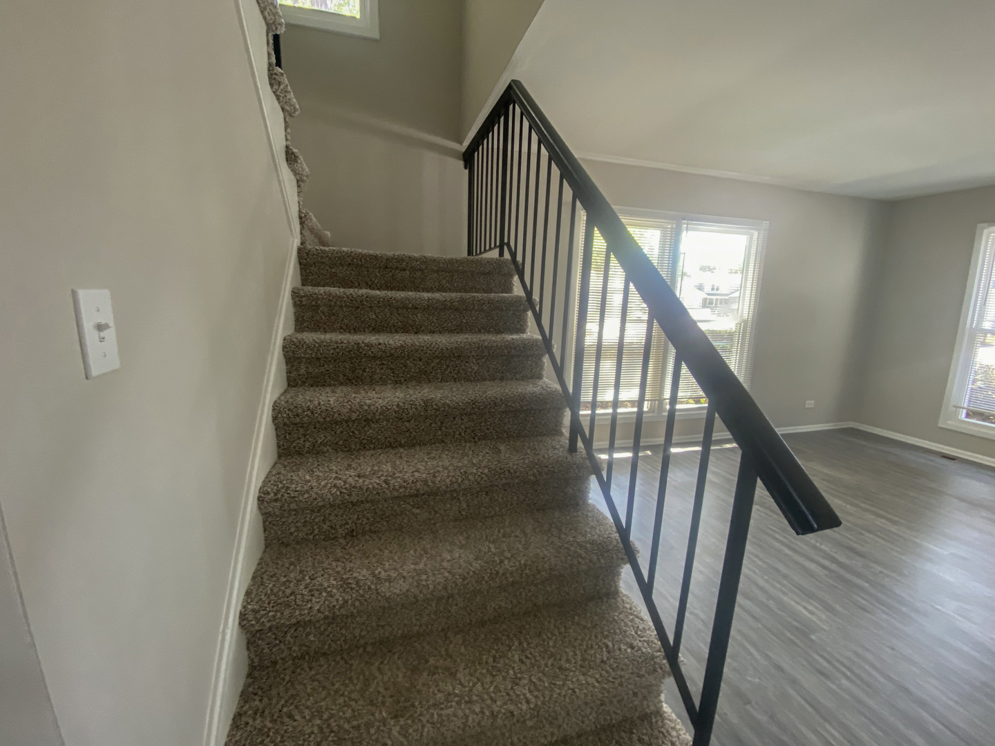 1920 Georgetown Lane Hoffman Estates, IL 60169 - Photo 20 of 28 a view of staircase with wooden floor and white walls