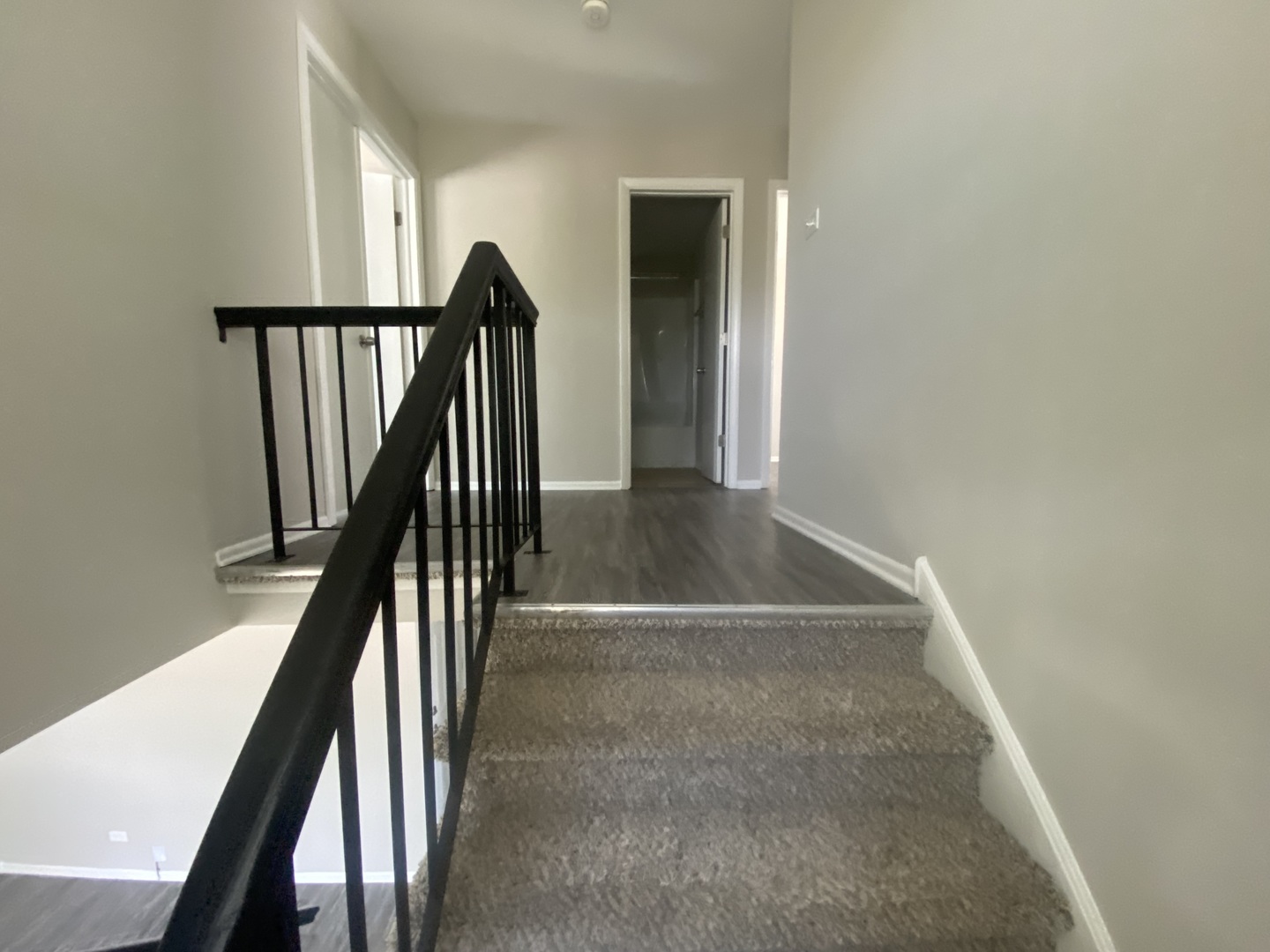 1920 Georgetown Lane Hoffman Estates, IL 60169 - Photo 21 of 28 a view of staircase with wooden floor and stairs