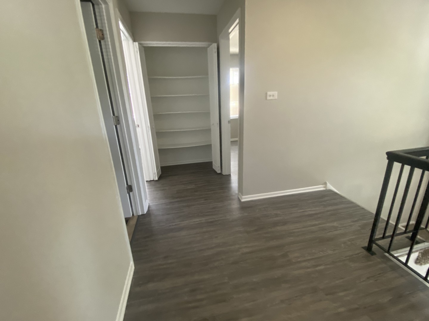 1920 Georgetown Lane Hoffman Estates, IL 60169 - Photo 23 of 28 an empty room with wooden floor and entrance