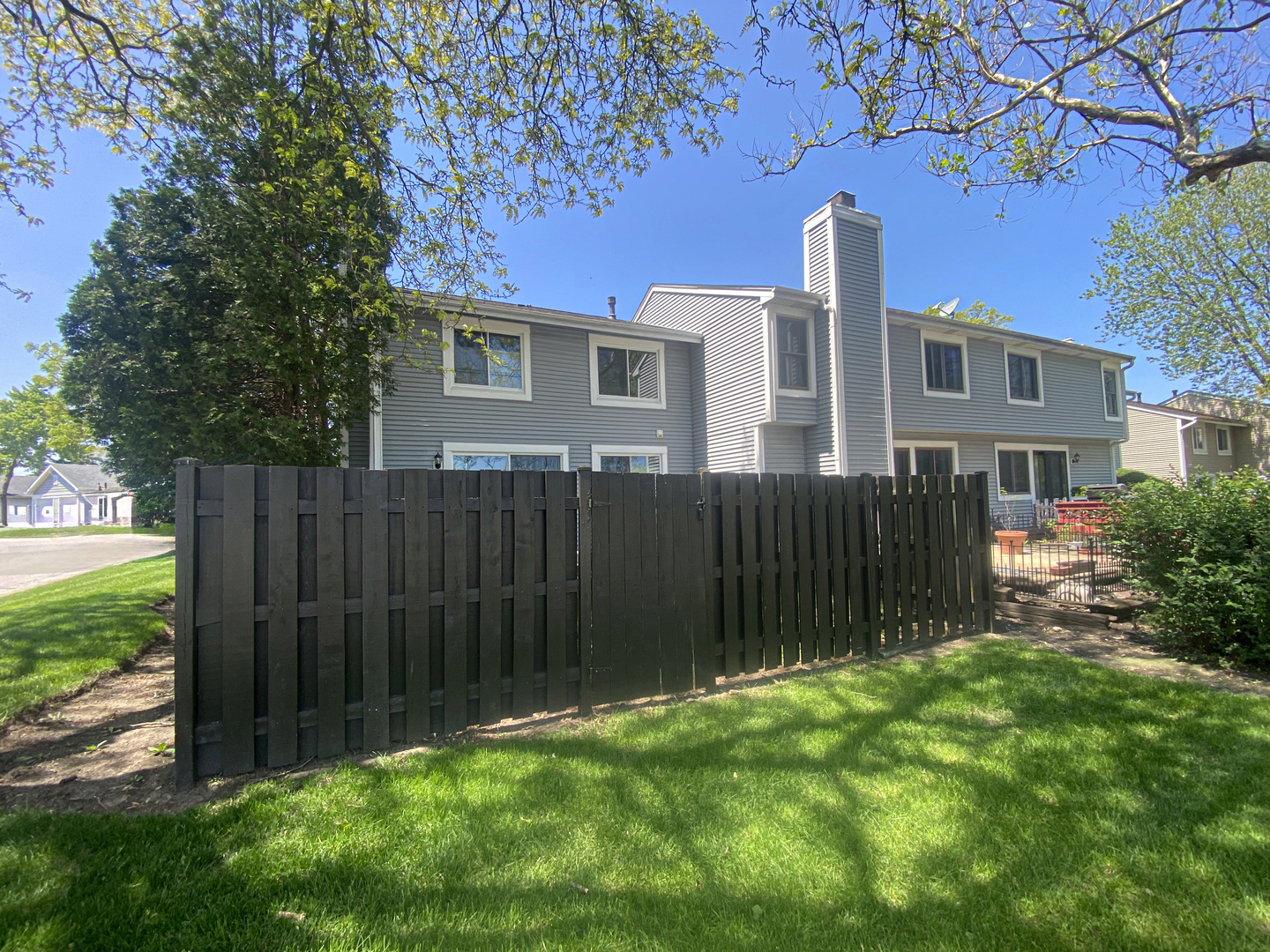 1920 Georgetown Lane Hoffman Estates, IL 60169 - Photo 5 of 28 a front view of a house with a garden
