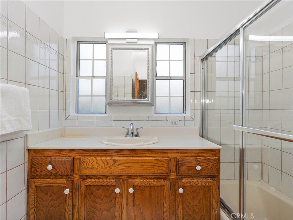 331 Allen Avenue Glendale, CA 91201 - Photo 23 of 61 a bathroom with a sink and a mirror