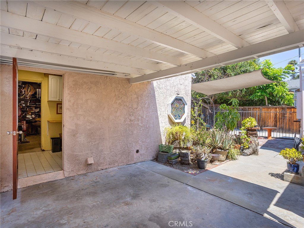331 Allen Avenue Glendale, CA 91201 - Photo 49 of 61 a front view of a house with outdoor seating and a garden