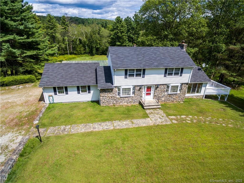 80 Cady Road Putnam, CT 06260 - Photo 1 of 1 a view of a house with a swimming pool