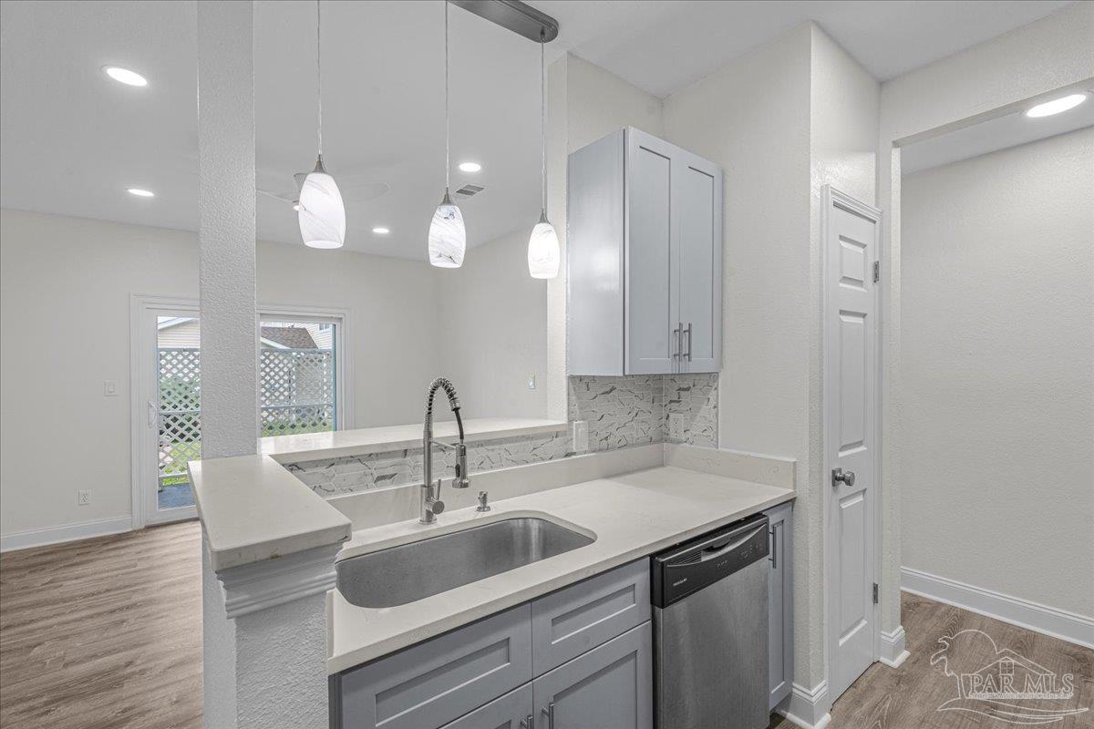 601 East Burgess Road, Unit C3 Pensacola, FL 32504 - Photo 11 of 35 a kitchen with a sink and cabinets