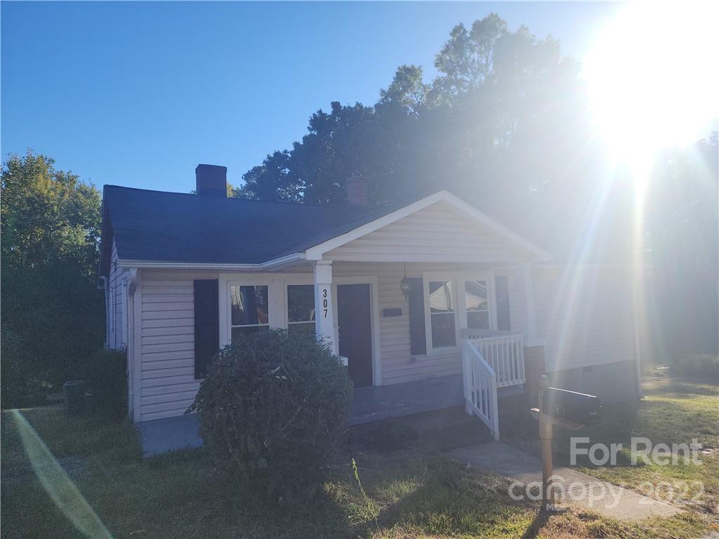 307 Rice Street Kannapolis, NC 28081 - Photo 2 of 7 a front view of a house with garden