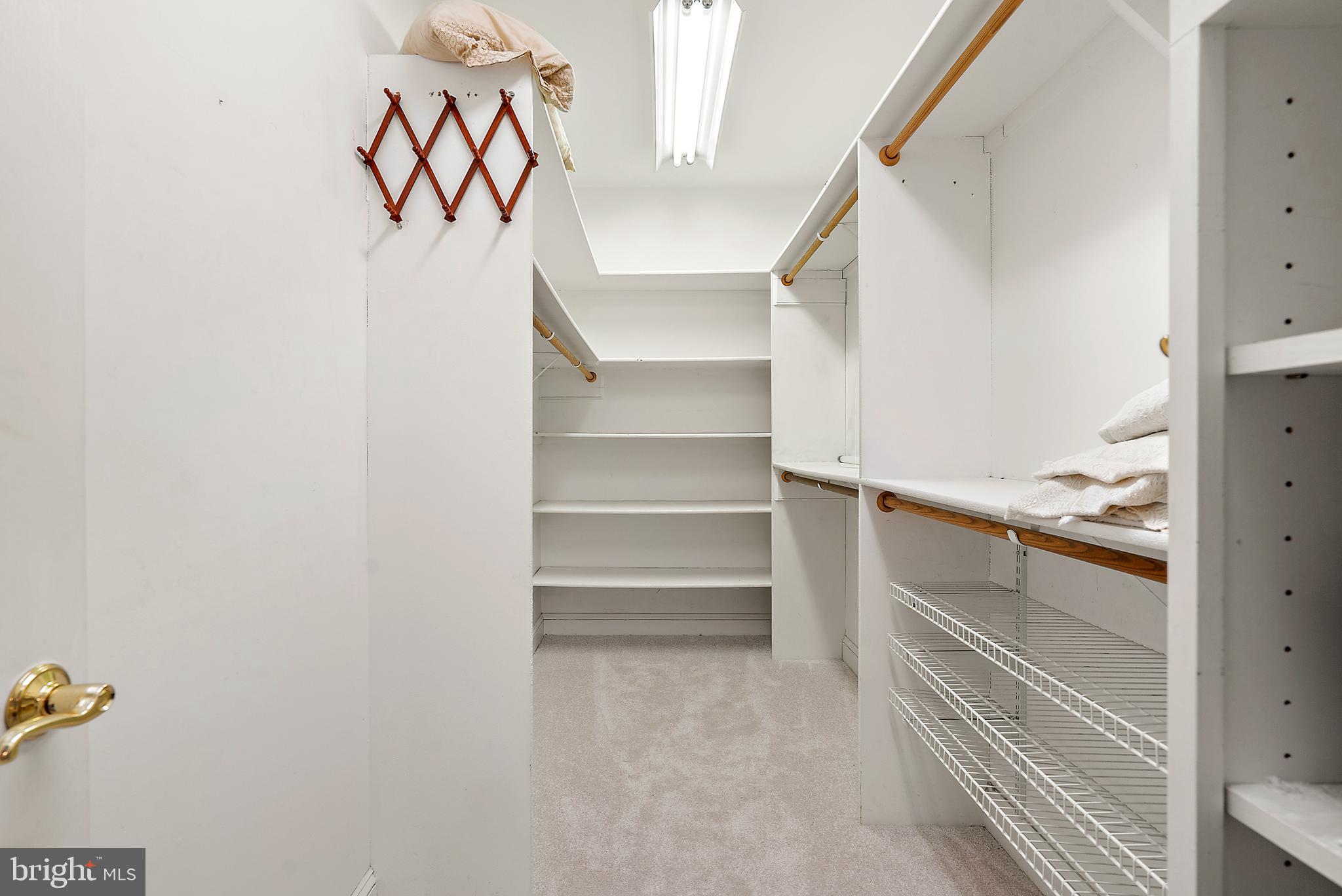 6276 Beverleys Mill Road Broad Run, VA 20137 - Photo 19 of 41 Huge walk in closet with shelves and hanging space