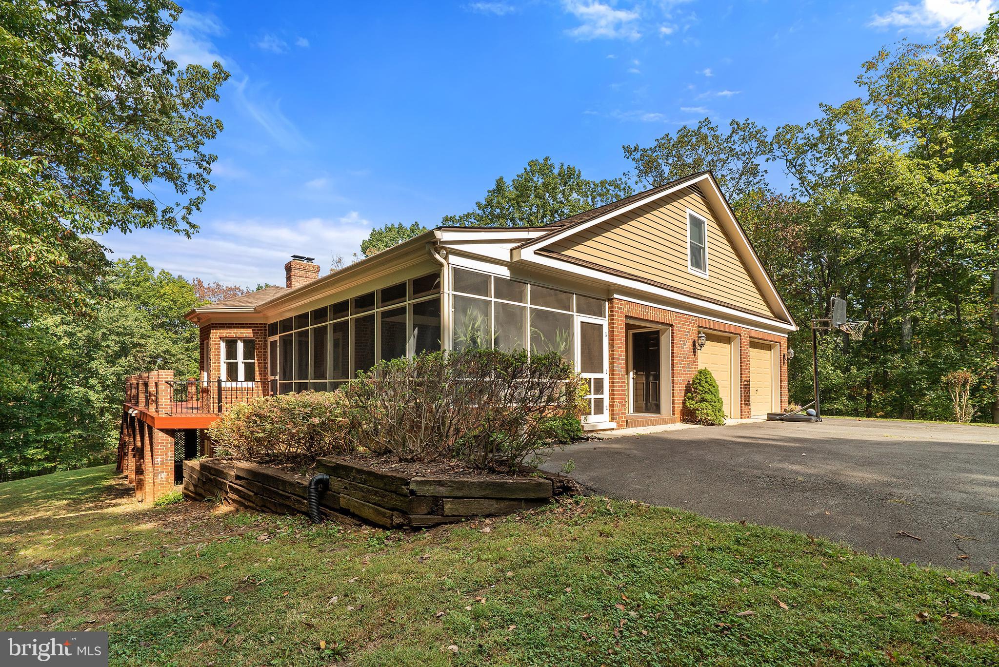 6276 Beverleys Mill Road Broad Run, VA 20137 - Photo 34 of 41 Terraced landscape beds and screened porch.