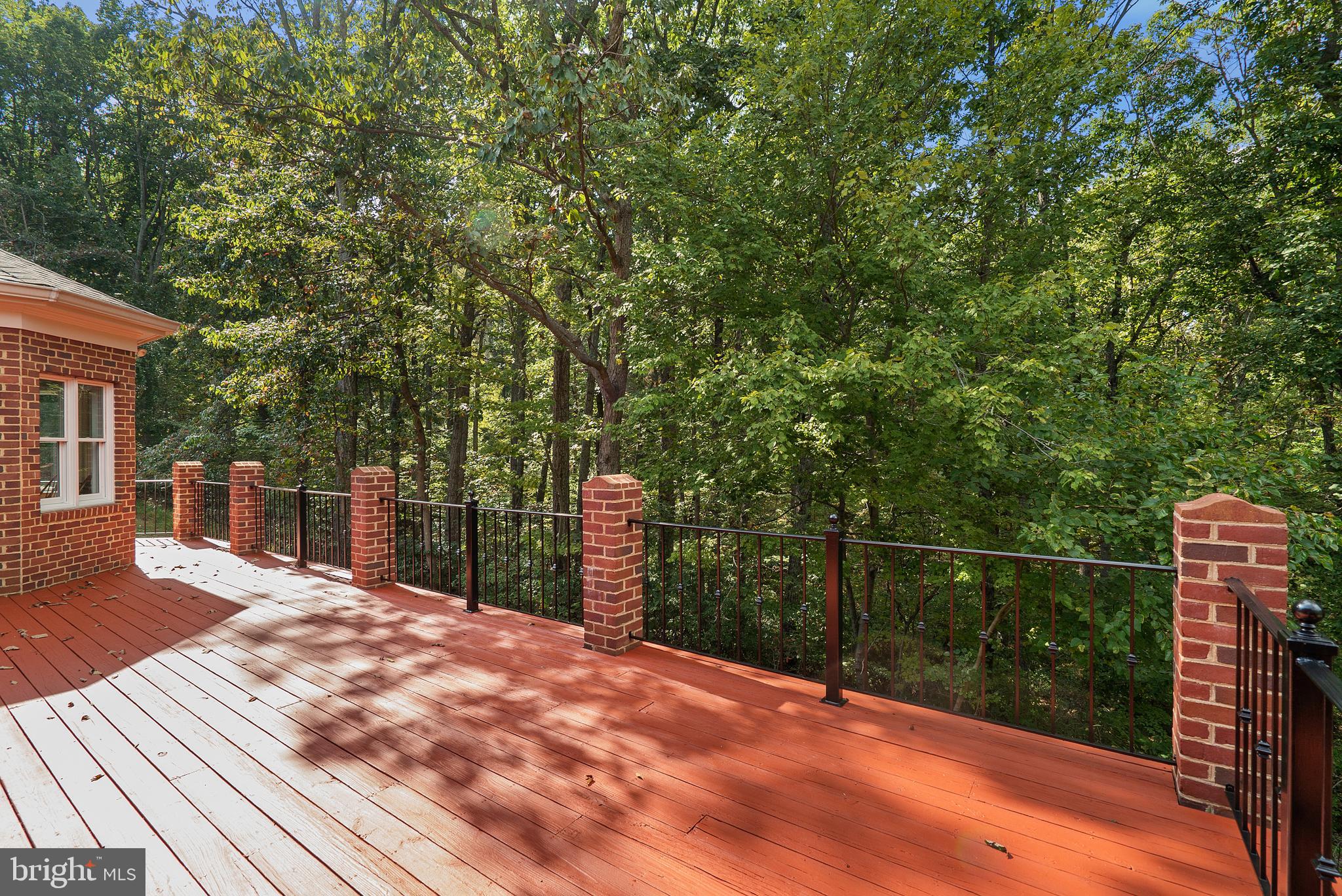 6276 Beverleys Mill Road Broad Run, VA 20137 - Photo 36 of 41 Brick and wrought iron railing on deck