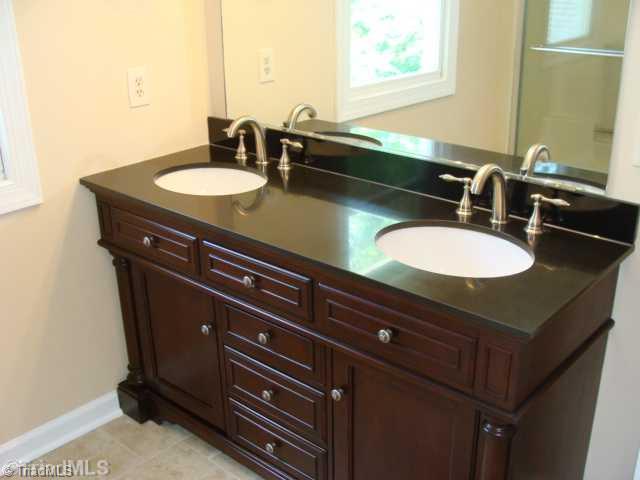 6865 High Rock Road Browns Summit, NC 27214 - Photo 14 of 16 Other Bath. Full bath on the 2nd level includes new elegant double vanity & ceramic tiled flooring!