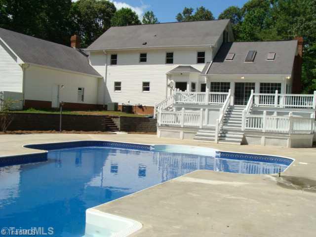 6865 High Rock Road Browns Summit, NC 27214 - Photo 16 of 16 Other. Huge double tiered deck! Massive home! Huge pool! 21+ acres of land!