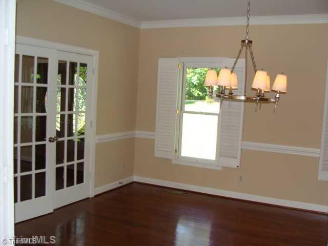 6865 High Rock Road Browns Summit, NC 27214 - Photo 4 of 16 Dining Room. Large formal dining room with 2 sets of french doors, one leading from the foyer and one leading into the kitchen!