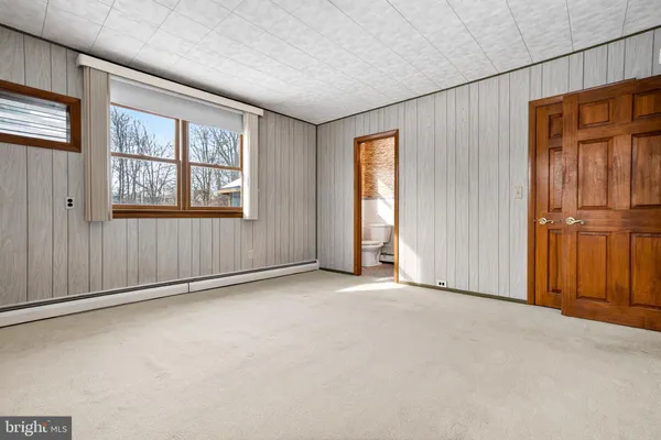 an empty room with windows