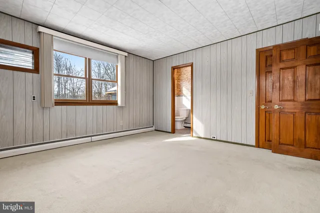 an empty room with windows