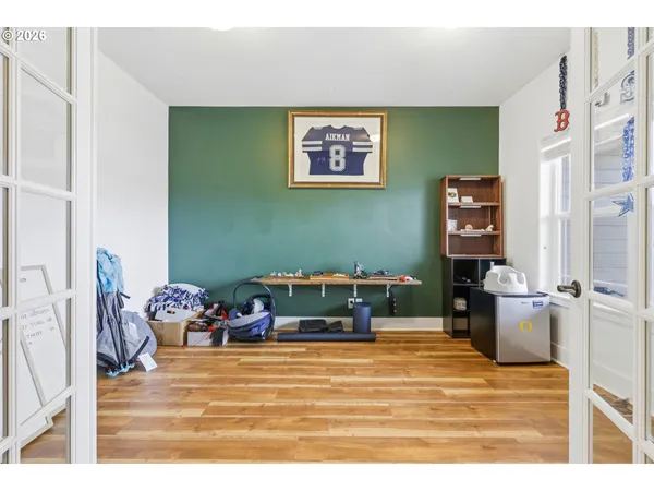 a bedroom with furniture and a bed